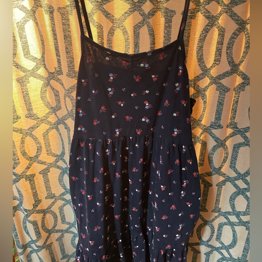 Girls Old Navy Blue Dress With A Fun Floral Pattern.